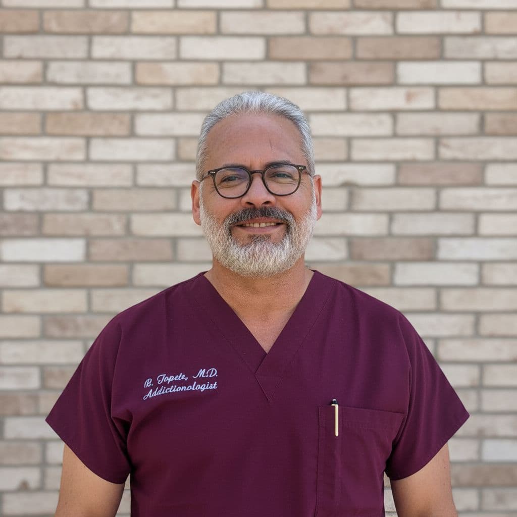 Reyes Topete, MD